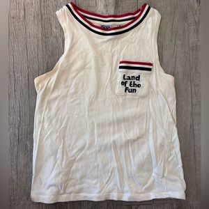 Off-white tank top with blue and red stipe details.